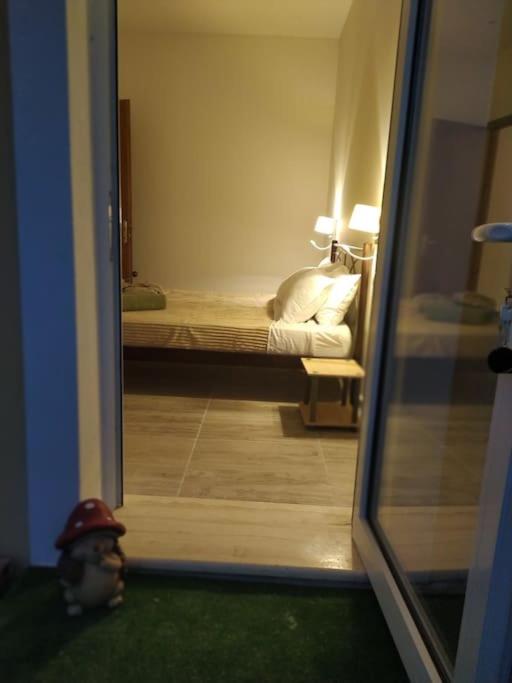 Postel nebo postele na pokoji v ubytování Nala's House