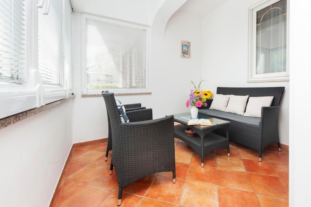 Posezení v ubytování Apartments Maxi