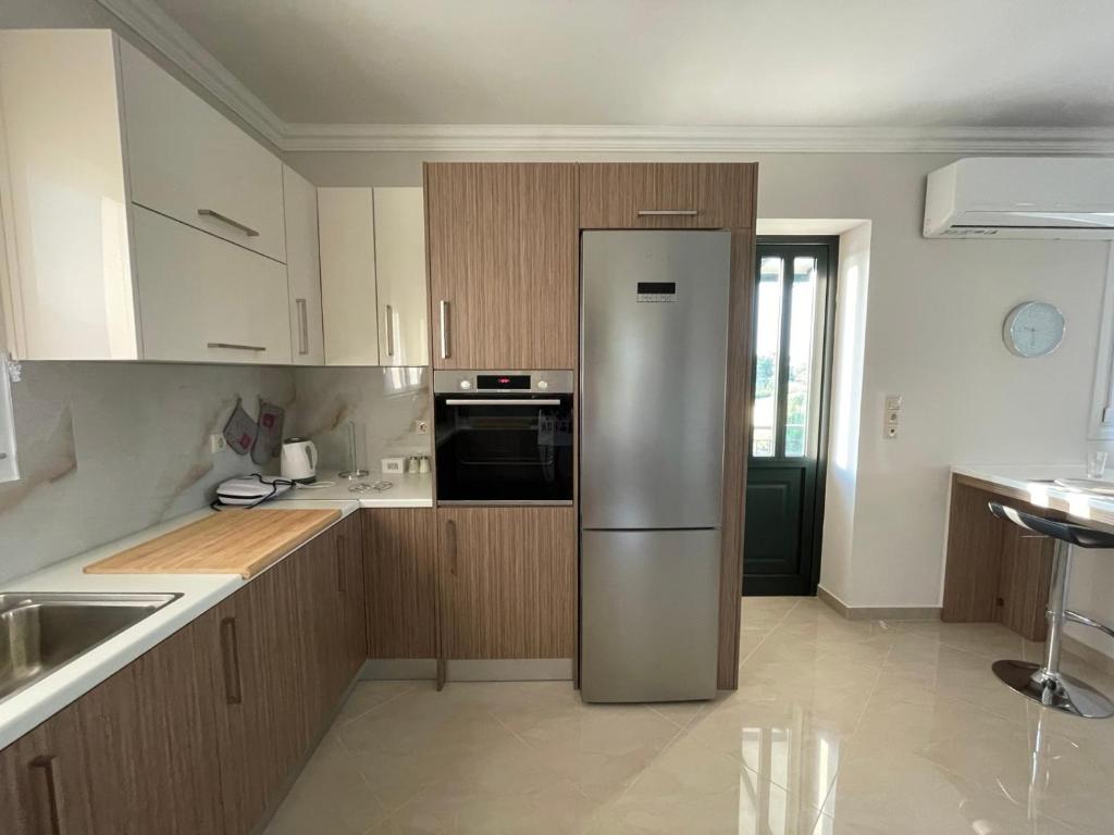 Kuchyň nebo kuchyňský kout v ubytování Tasos Cozy House