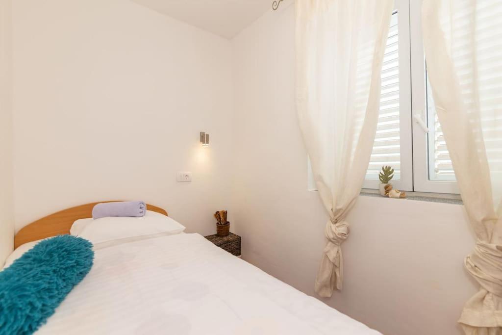 Postel nebo postele na pokoji v ubytování Holiday Home Šćurla