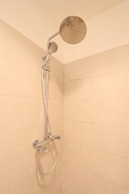 Koupelna v ubytování Maor Hotel