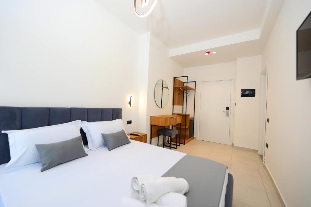 Postel nebo postele na pokoji v ubytování Maor Hotel