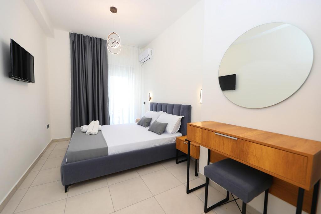 Postel nebo postele na pokoji v ubytování Maor Hotel