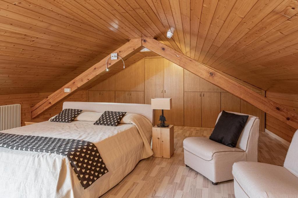Postel nebo postele na pokoji v ubytování Hotel Pangrazzi - 3 stelle superior