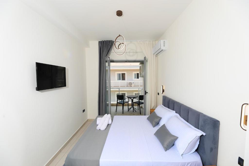 Postel nebo postele na pokoji v ubytování Maor Hotel
