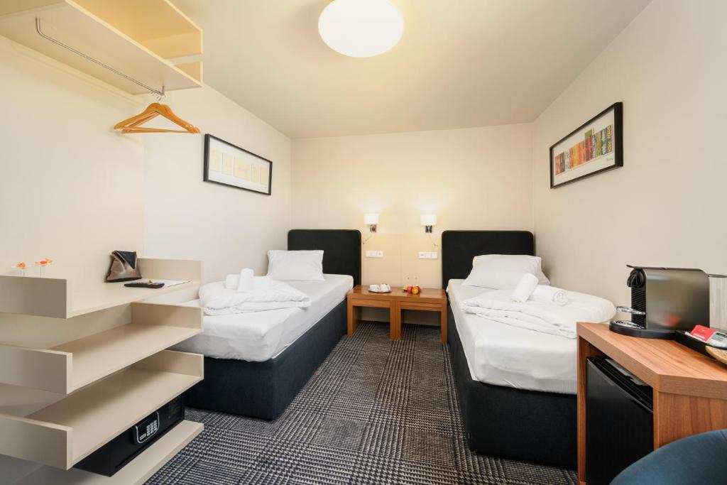 Postel nebo postele na pokoji v ubytování Hotel Premier- Adults Only