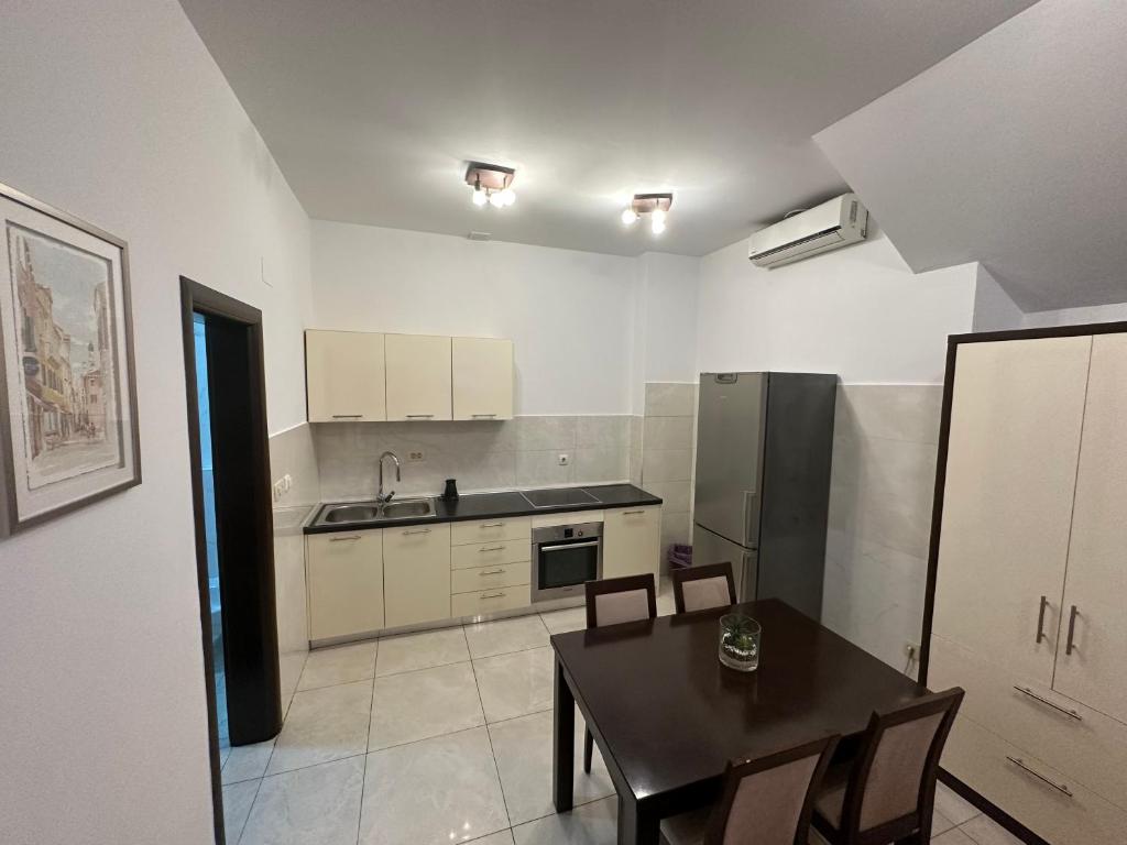 Kuchyň nebo kuchyňský kout v ubytování Shine residence