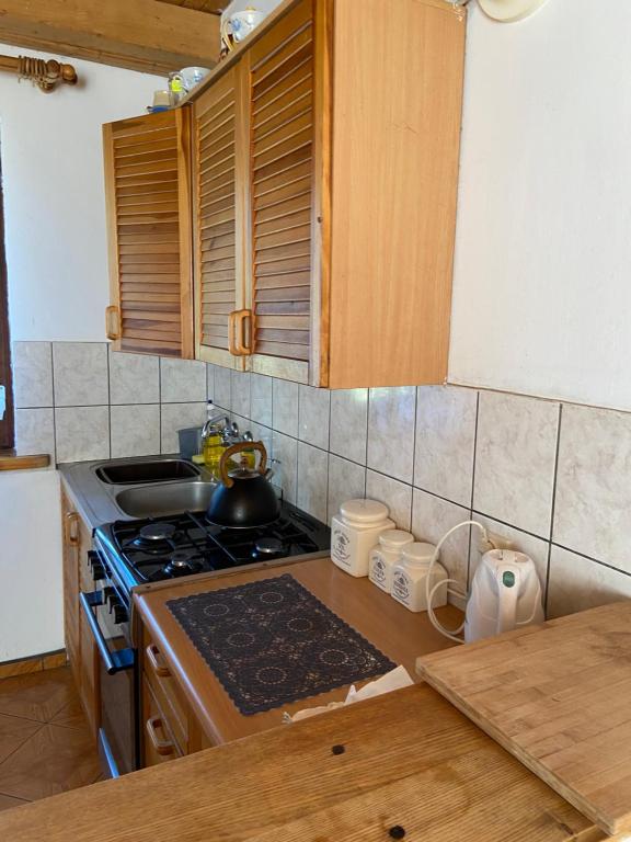Kuchyňa alebo kuchynka v ubytovaní Gunia Gesthouse