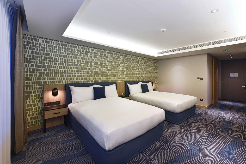 Postel nebo postele na pokoji v ubytování Fullon Poshtel - Kaohsiung