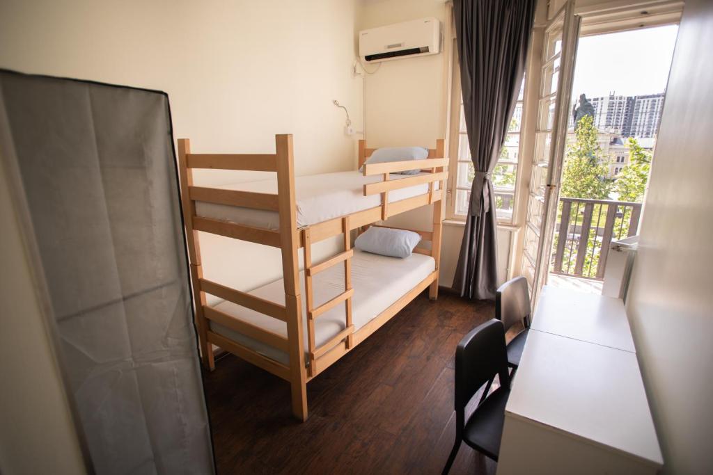 Postel nebo postele na pokoji v ubytování All in Hostel