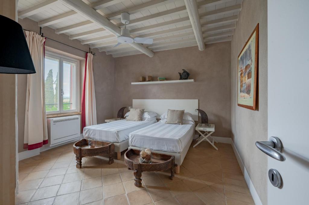 Televízia a/alebo spoločenská miestnosť v ubytovaní Le Versegge Resort