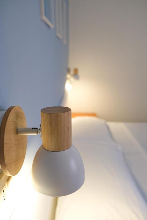 Postel nebo postele na pokoji v ubytování Hotel Vienna