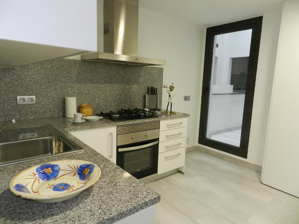 Kuchyňa alebo kuchynka v ubytovaní Apartaments El Cine