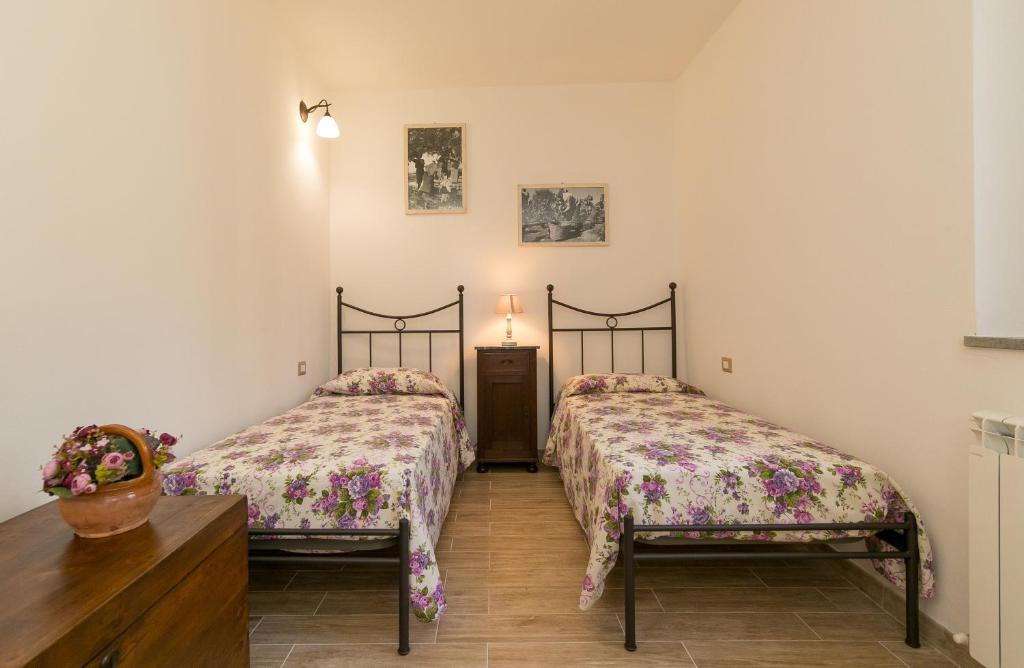 Postel nebo postele na pokoji v ubytování Villa Adelmo