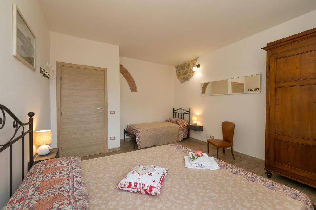Postel nebo postele na pokoji v ubytování Villa Adelmo