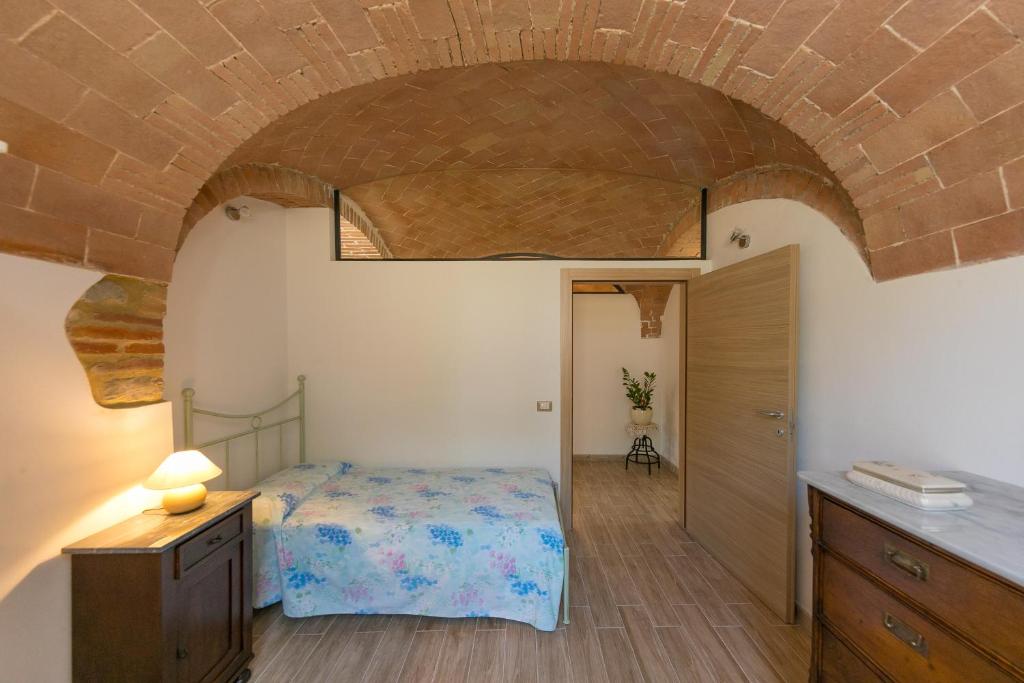Postel nebo postele na pokoji v ubytování Villa Adelmo