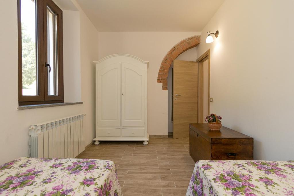 Postel nebo postele na pokoji v ubytování Villa Adelmo