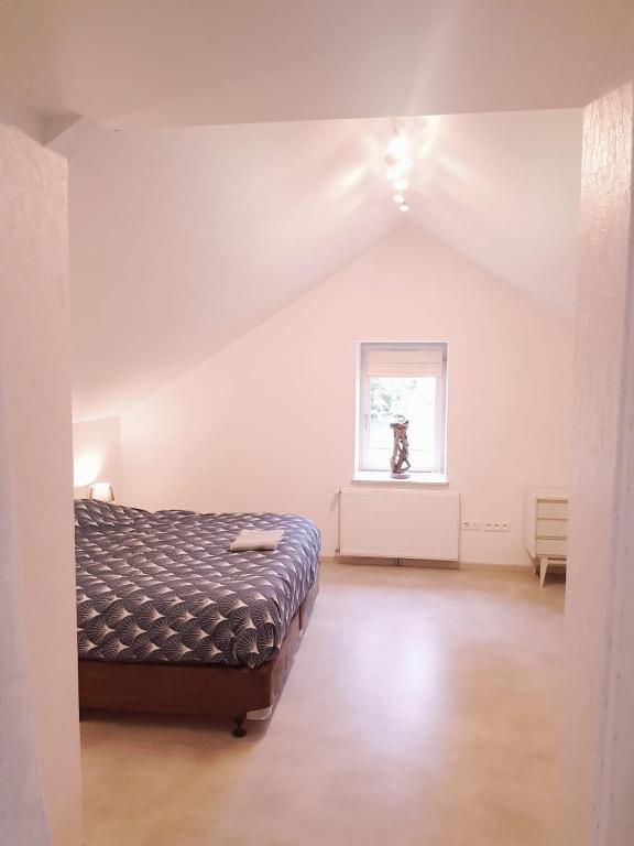 Postel nebo postele na pokoji v ubytování Auberge De Carlucet