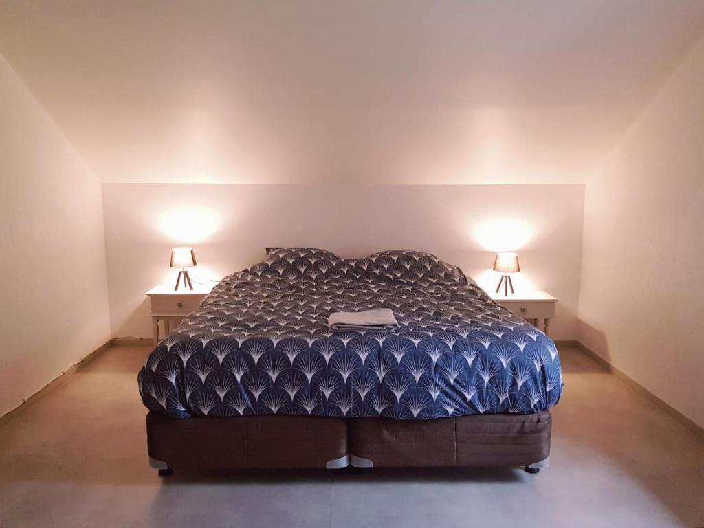 Postel nebo postele na pokoji v ubytování Auberge De Carlucet