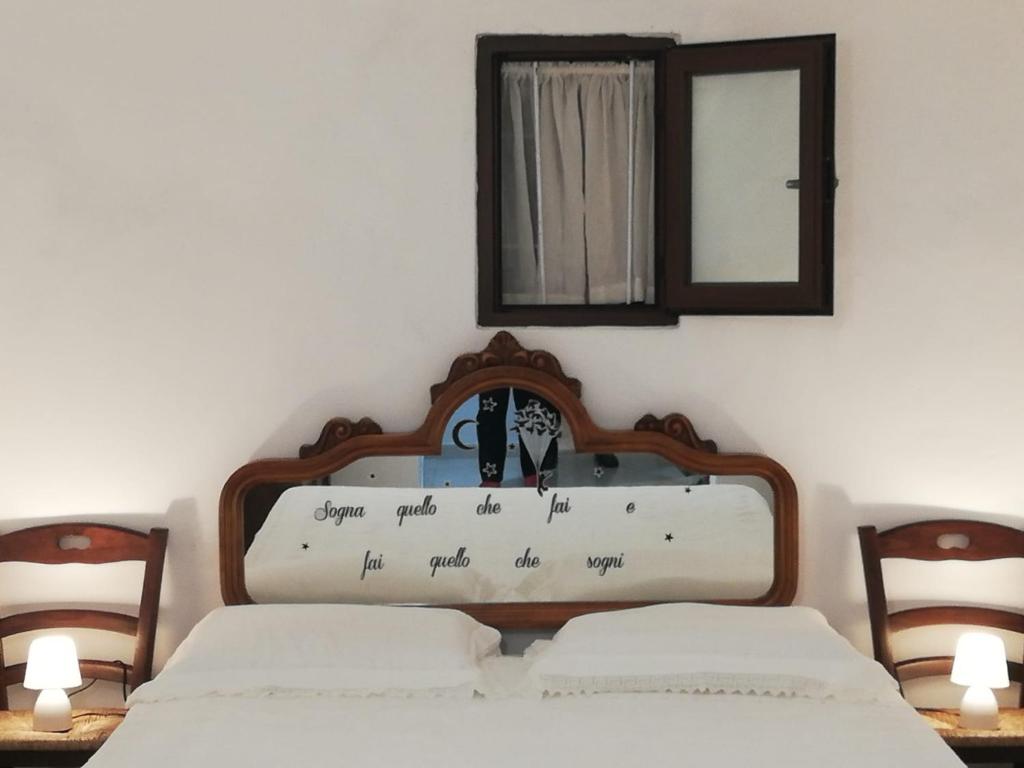 Posteľ alebo postele v izbe v ubytovaní Ciao b&b