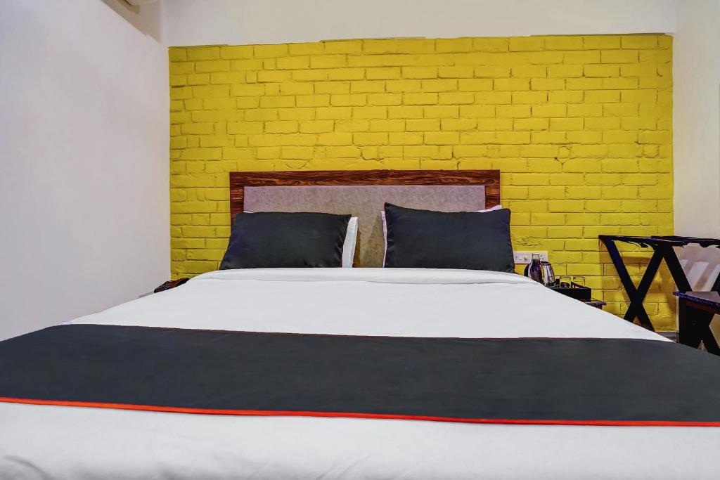 Postel nebo postele na pokoji v ubytování Super Collection O Kalinga Bapuji Nagar
