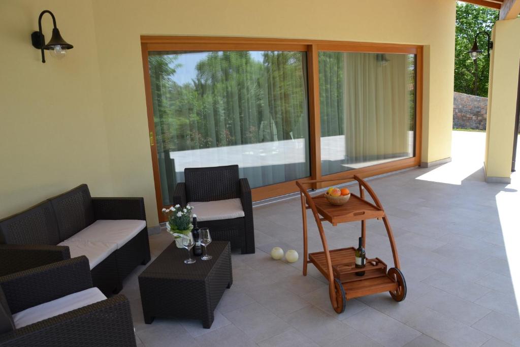 a living room with a couch and a table at Agriturismo Gradec in Aurisina