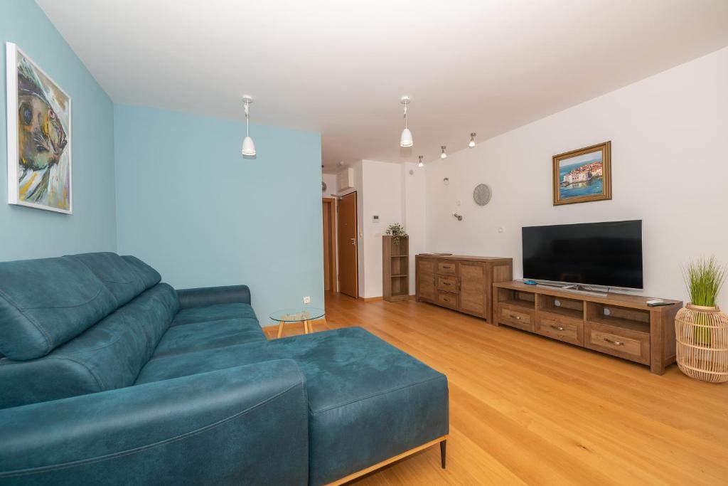 Televízia a/alebo spoločenská miestnosť v ubytovaní Apartment Daniel