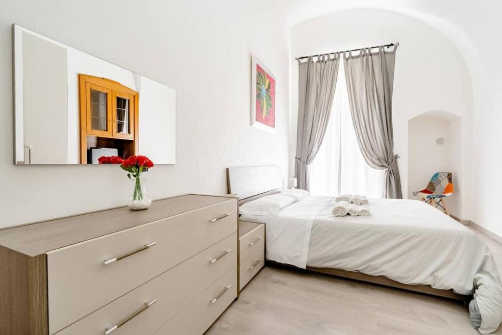 Postel nebo postele na pokoji v ubytování B&b SAN LORENZO