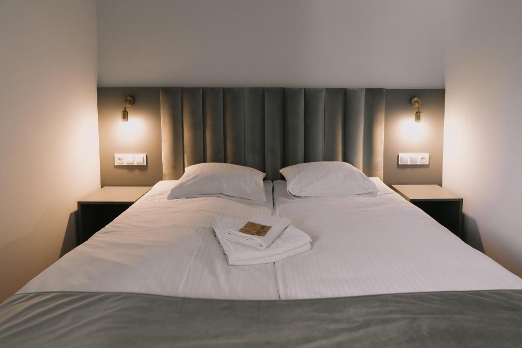 Postel nebo postele na pokoji v ubytování Między Murami