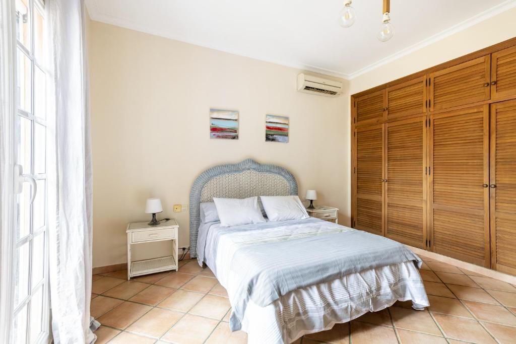 Postel nebo postele na pokoji v ubytování Villa Laforge