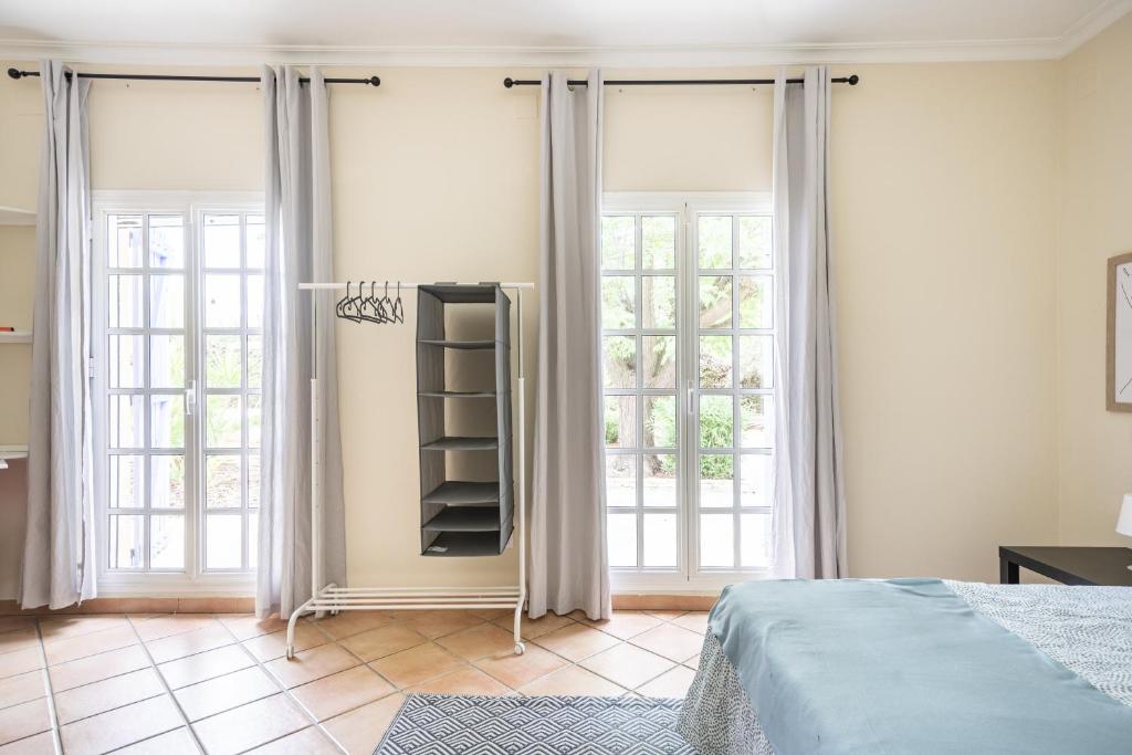 Postel nebo postele na pokoji v ubytování Villa Laforge