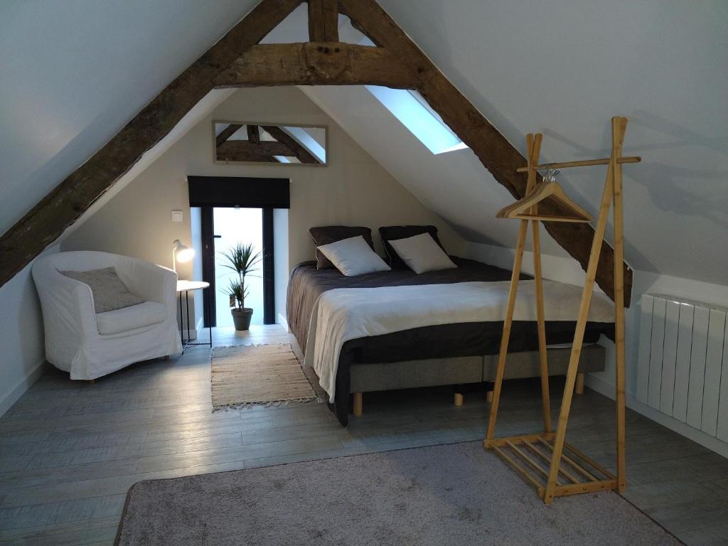 Postel nebo postele na pokoji v ubytování Gîte charmant typique Breton Ti Quartier