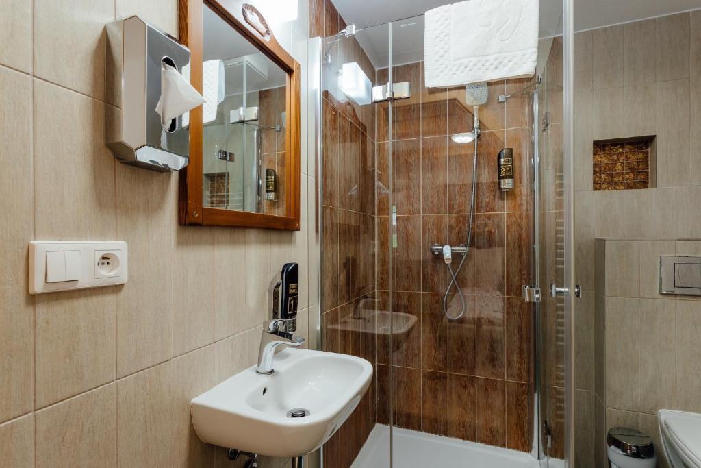 Koupelna v ubytování Wellness rezort Jánošíkov dvor