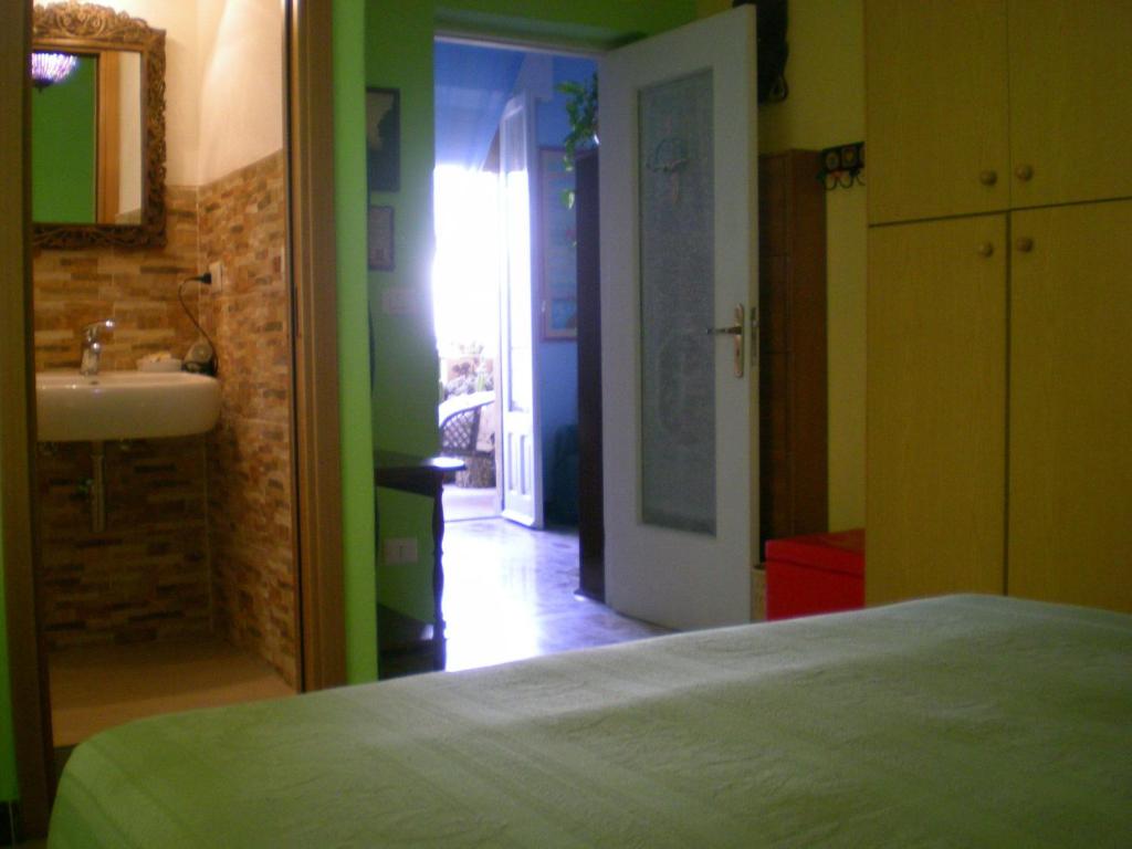 Łóżko lub łóżka w pokoju w obiekcie Orizzonte B&B