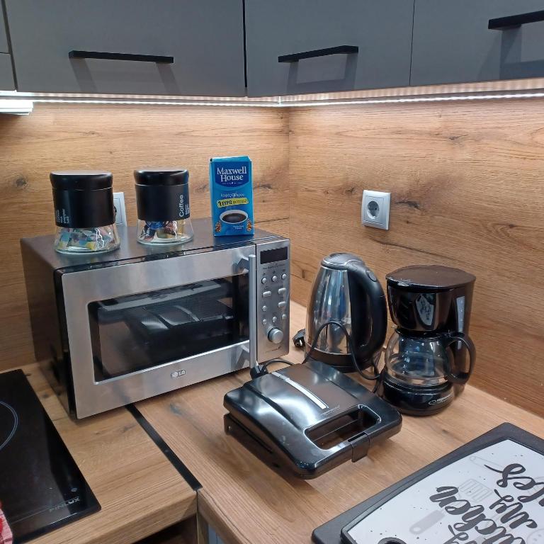 Kuchyň nebo kuchyňský kout v ubytování Doukas Home