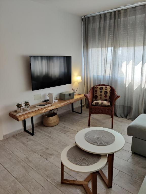 A television and/or entertainment centre at SHERRY HOME