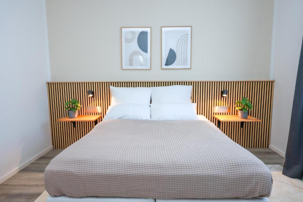 Postel nebo postele na pokoji v ubytování 75qm Luxusapartment in perfekter Lage