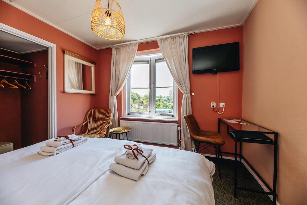Postel nebo postele na pokoji v ubytování Maison Bellefleur B&B - Pension