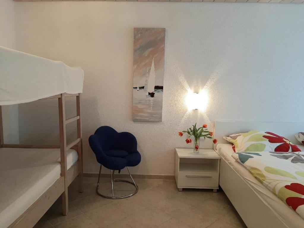 Posteľ alebo postele v izbe v ubytovaní Traum Ferienwohnung mit Pool am Meer, Kroatien, Istrien, Liznjan bis 6 Personen, Urlaub an der Adria