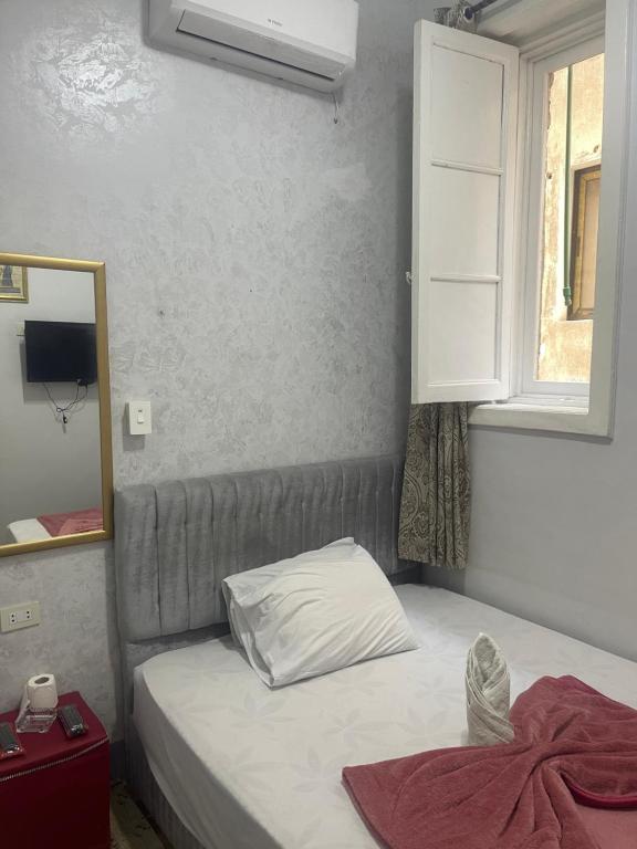 Postel nebo postele na pokoji v ubytování New One Hotel