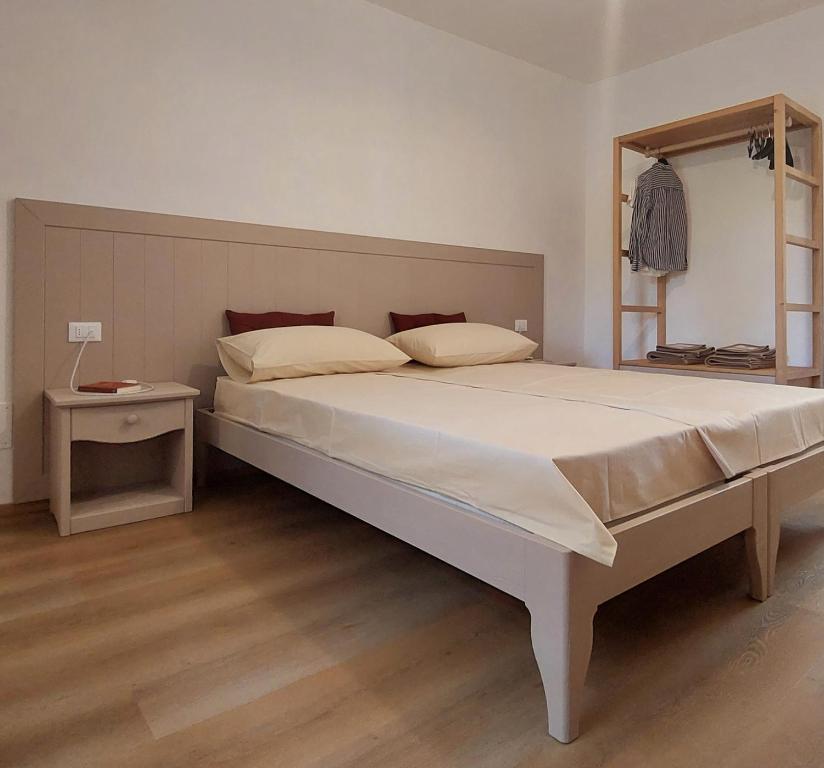 Łóżko lub łóżka w pokoju w obiekcie Agriturismo l'Eremo