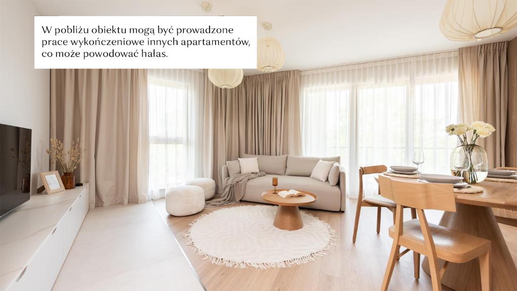 Flatbook - Seaside Apartments Porto Gdańsk tesisinde bir oturma alanı