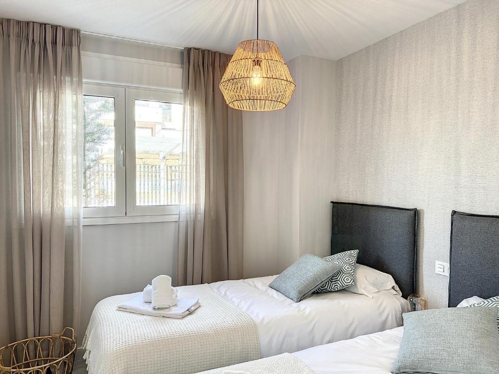 Postel nebo postele na pokoji v ubytování Via Celere 2333 Luxury Sea View Apartment