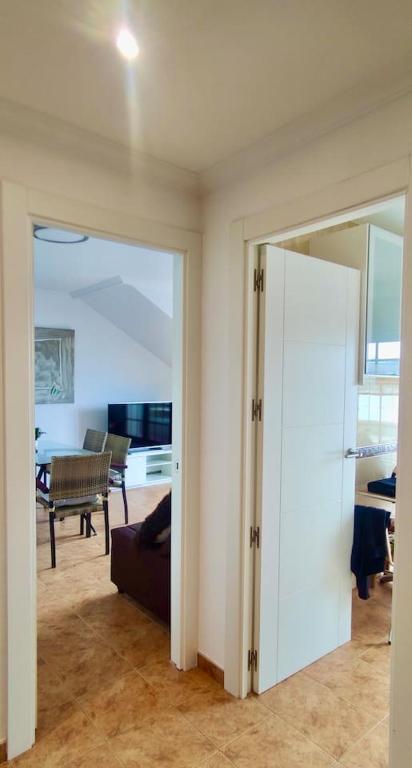 Telewizja i/lub zestaw kina domowego w obiekcie Apartamento Porto do Xufre