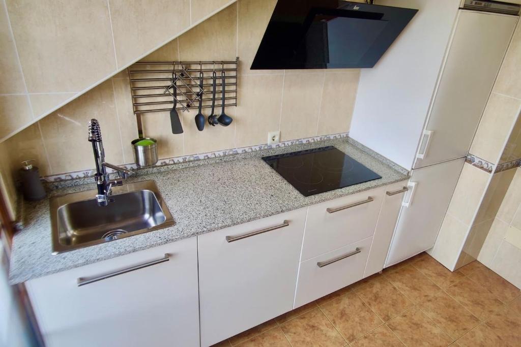 Kuchnia lub aneks kuchenny w obiekcie Apartamento Porto do Xufre