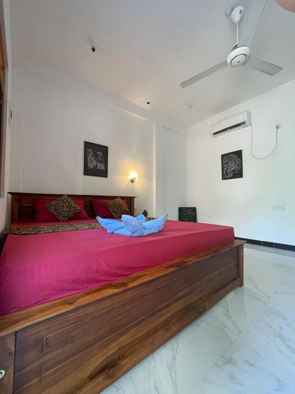 Postel nebo postele na pokoji v ubytování Ubay Guest House