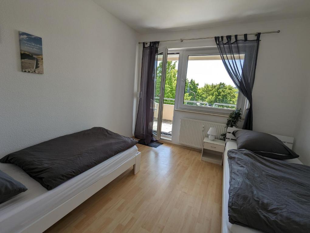 Postel nebo postele na pokoji v ubytování Feldberg Appartement