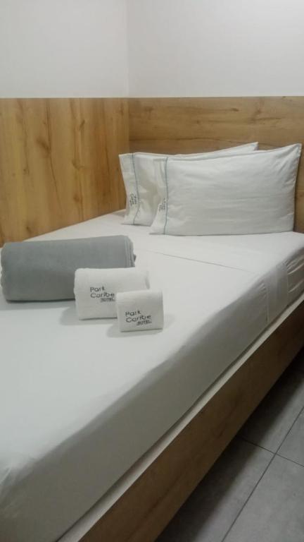 Postel nebo postele na pokoji v ubytování Hotel Park Caribe