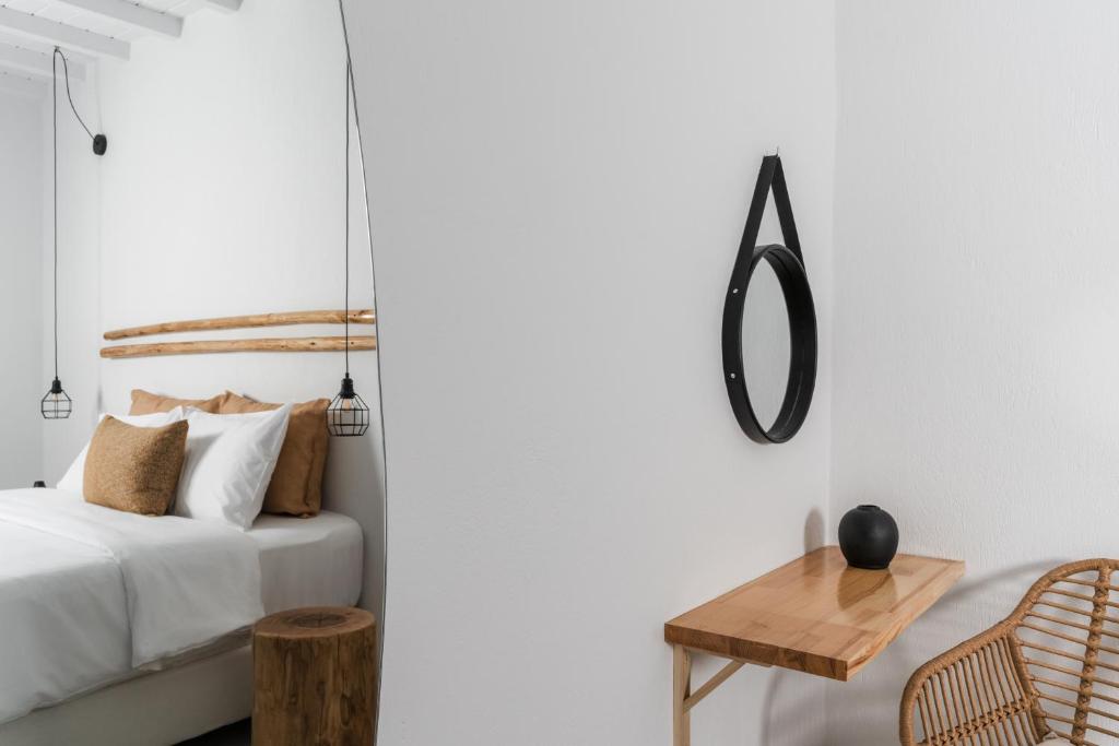Postel nebo postele na pokoji v ubytování Penelope Village