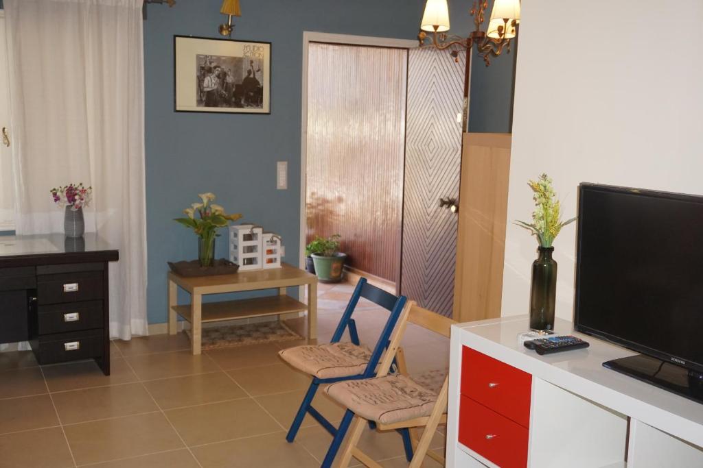 Televízia a/alebo spoločenská miestnosť v ubytovaní Seaside Cottage